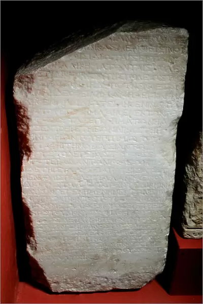 Inscribed marble stele recording a dispute between the islands of Paros and Naxos