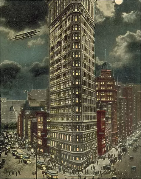 Flatiron Building at night, Boadway and Fifth Avenue, New York City, New York, USA (coloured photo)
