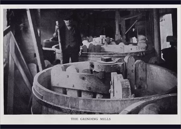 The grinding mills at a pottery factory (b  /  w photo)