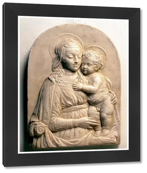 The Virgin with the Child. Marble lowrelief