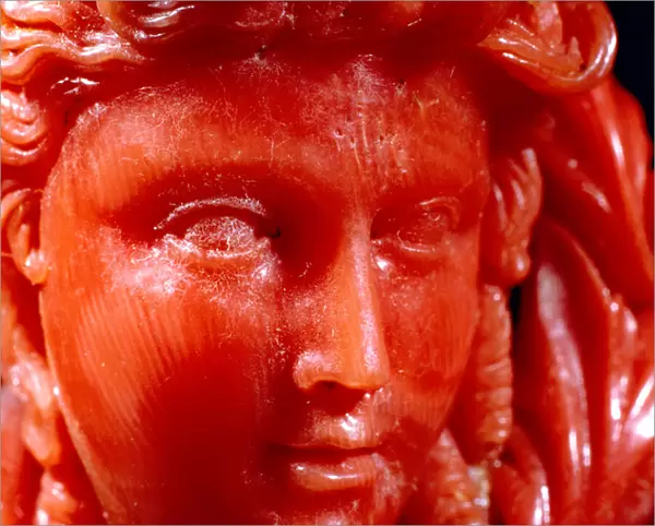 Pendent of a classical head and anaphora in mediterranean coral and gold (detail)