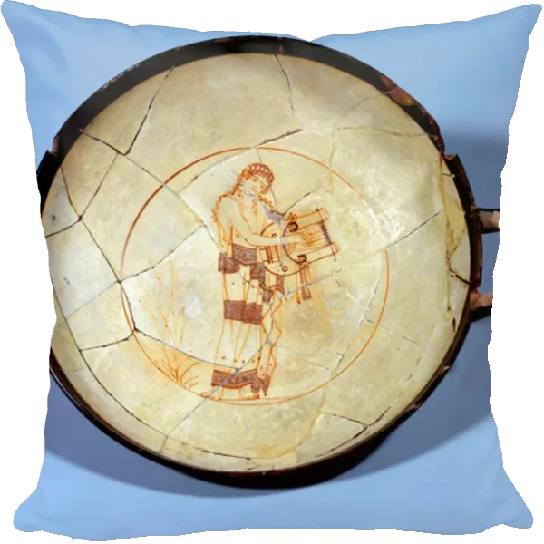 Greek art: cup with white background in ceramic decoree of a muse playing the cithar