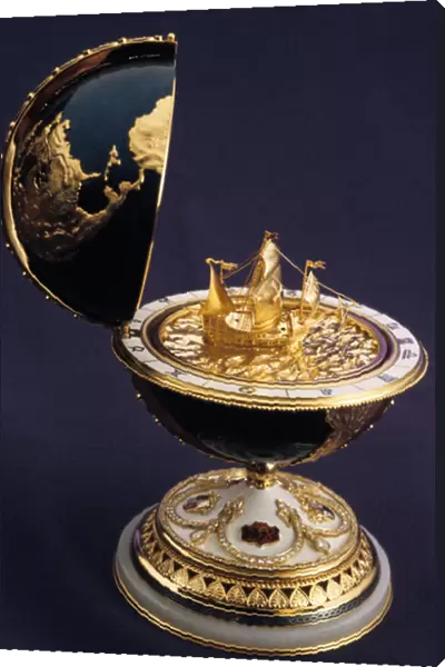 Faberge egg in the shape of a globe with a model of a ship inside (columbus ?)