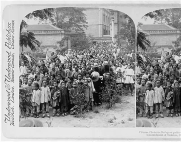 Chinese Christian refugees gathered by Father Quilloux into the Apostolic Mission during bombardment of Tientsin during the Boxer Rebellion, c. 1901 (b  /  w photo)