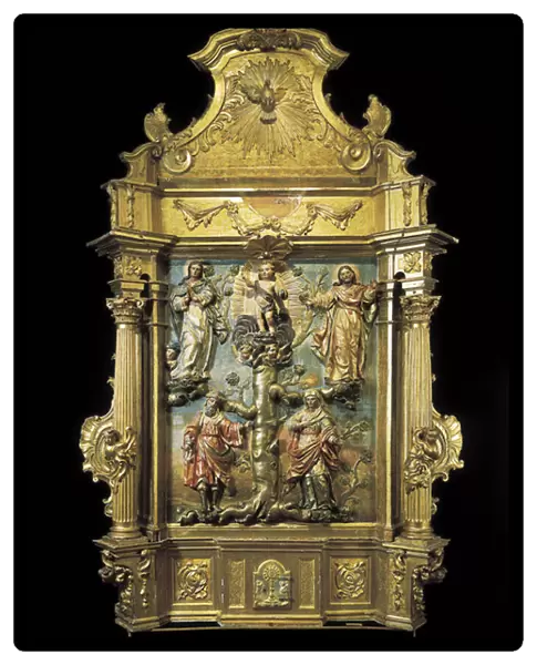 Baroque art: altarpiece of the genealogy of Christ. The Jesus child at the top of the tree of his ascendants Mary and Joseph. Polychrome wood by Pedro de Sierra (1702-1760) 18th century