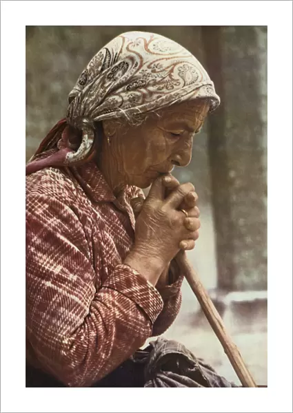 Early colour photography: Old Italian woman from Assisi (colour photo)