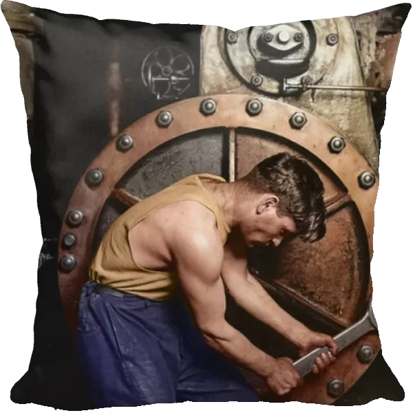 Power house mechanic working on steam pump c. 1920 (coloured photo)