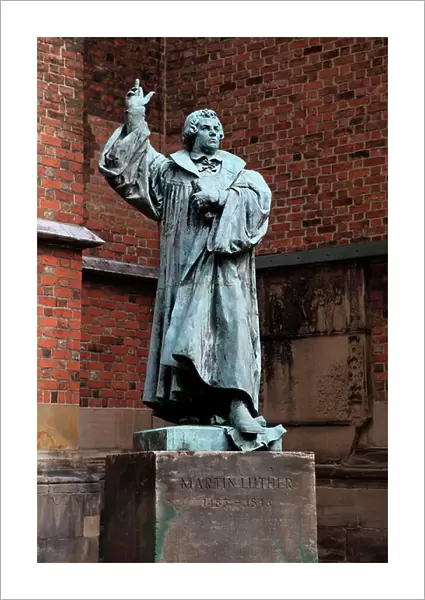 Statue of Martin Luther in front of the Protestant-Lutheran Market Church of St. Georgii