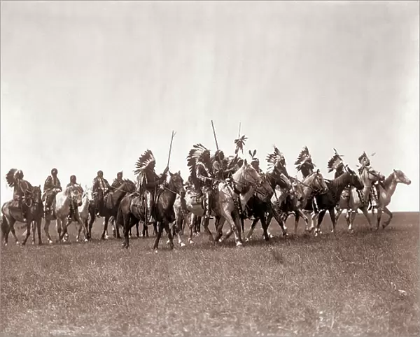 Brule Sioux War Party by Edward S. Curtis, c. 1907 (toned silver print)