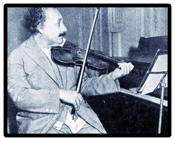 Albert Einstein playing his violin (b / w photo)