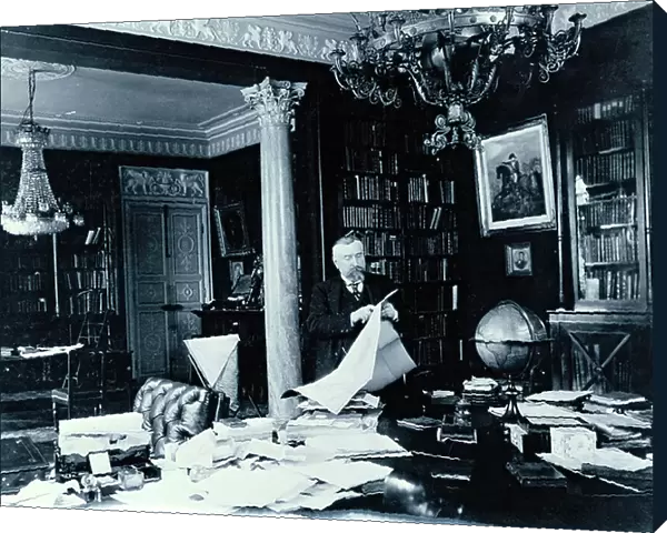 Portrait of Paul Marmottan (1856-1932) in his study, 1911 (b / w photo)