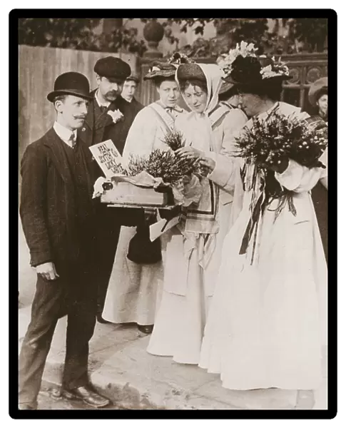 Christabel Pankhurst and Emmeline Pethick Lawrence purchasing Scottish heather for the release of Mary Philips, 18th September, 1908 (sepia photo)