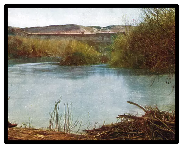 Jordan river - Arab hunter seated on river bank (psotcard)