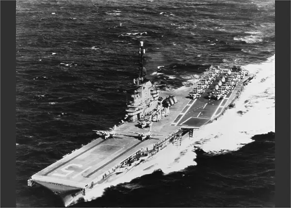 USS Randolph underway at sea with two S2F airplanes on its catapults, 1962