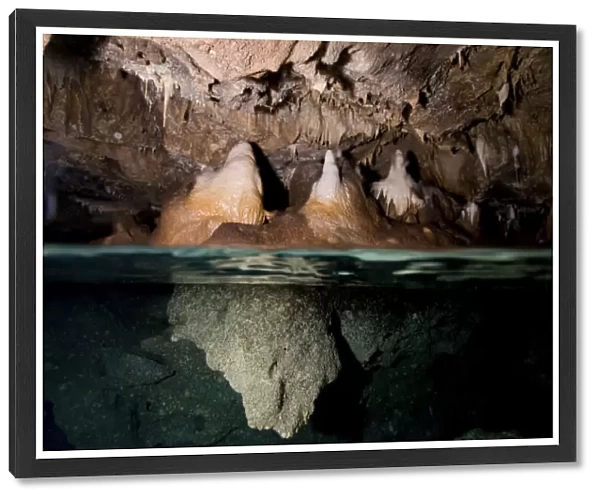 Split shot of stalactites and stalagmites in a cave, Australia