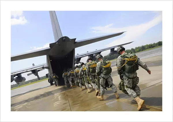 U. S. Army Rangers board a U. S. Air Force MC-130 Combat Talon II