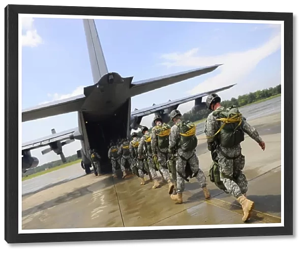 U. S. Army Rangers board a U. S. Air Force MC-130 Combat Talon II
