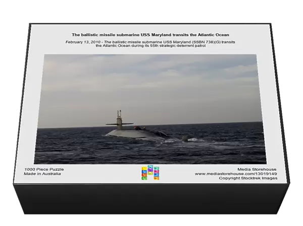 The ballistic missile submarine USS Maryland transits the Atlantic Ocean