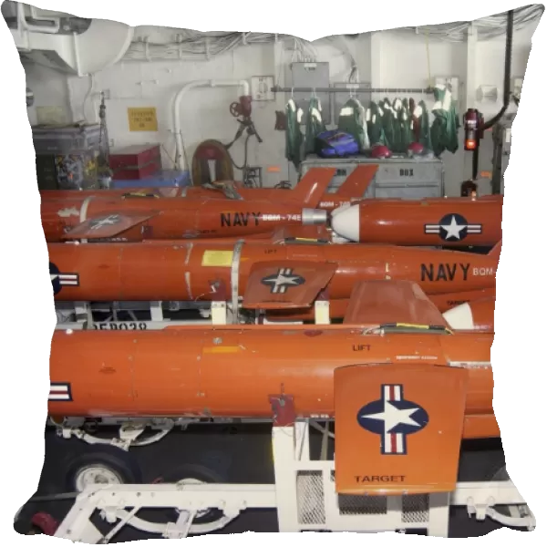 BQM-74E Chukar target drones stowed aboard USS Cushingas hanger bay