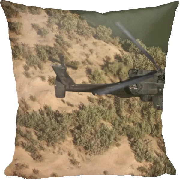 An AH-64D Apache helicopter in flight over Northern Iraq