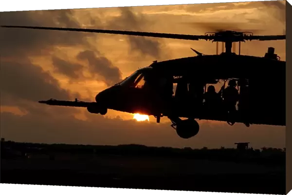 An HH-60G Pave Hawk helicopter prepares to land