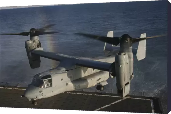 An MV-22 Osprey prepares to land aboard USNS Robert E. Peary