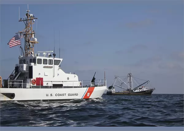 U. S. Coast Guard Cutter Marlin patrols the waters south of Pensacola Bay