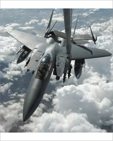 An F-15 E Strike Eagle receives fuel from a KC-10 Extender