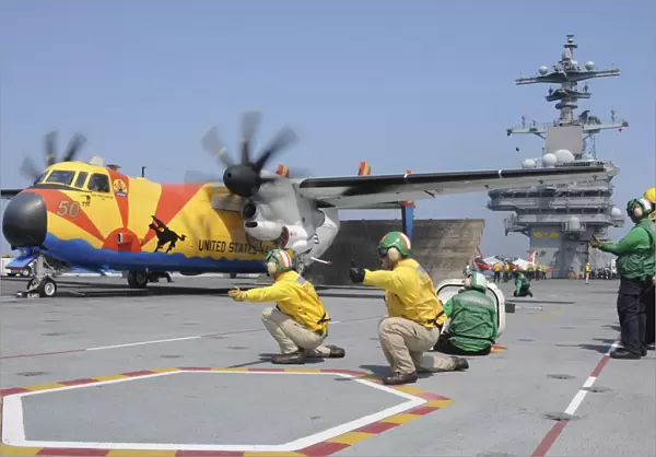 U. S. Navy shooters launch a C-2A Greyhound aircraft from the aircraft carrier USS George H