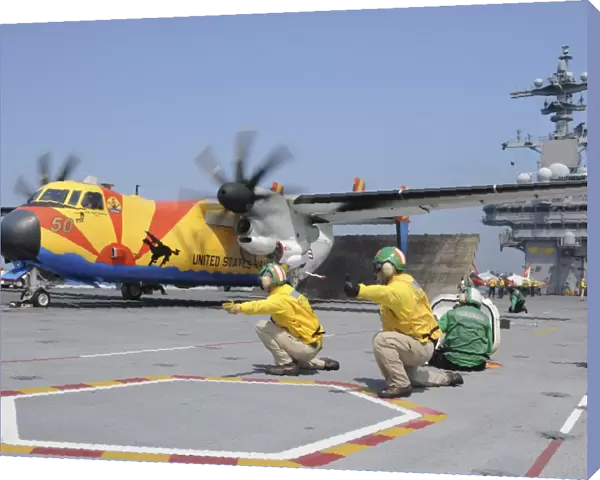 U. S. Navy shooters launch a C-2A Greyhound aircraft from the aircraft carrier USS George H