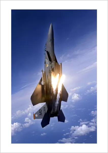 An F-15E Strike Eagle pops flares