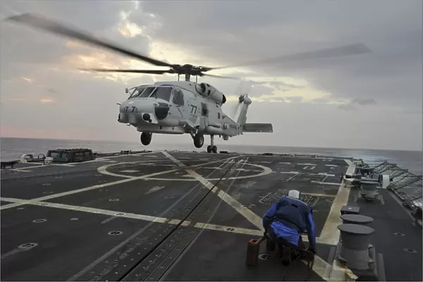 A Japan Maritime Self-Defense Force SH-60J Sea Hawk helicopter
