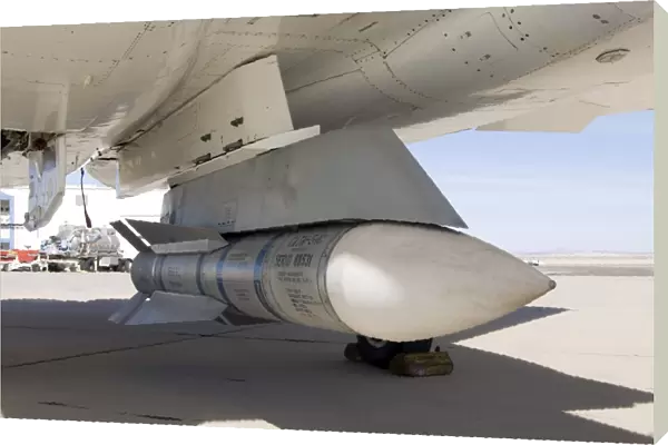 Surplus Navy Phoenix missiles mounted on the centerline pylon of NASAs F-15B research