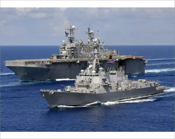 Amphibious assault ship USS Nassau and guided missile destroyer USS Bulkeley transit