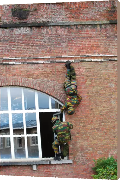 Belgian paratroopers rappelling in a hostage rescue training session