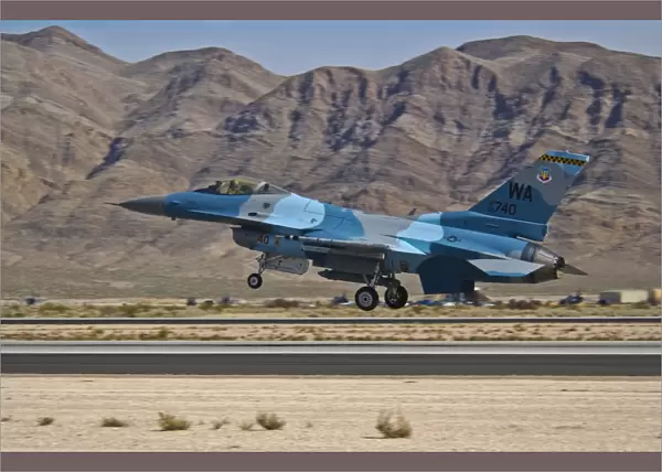 A U. S. Air Force F-16C taking off from Nellis Air Force Base