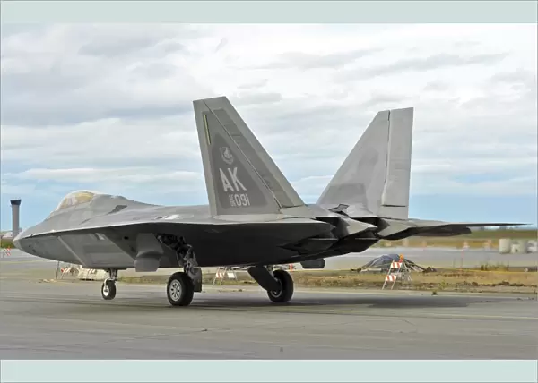 An F-22 Raptor taxis the runway on Elmendorf Air Force Base, Alaska