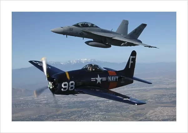 F  /  A-18 Hornet and F8F Bearcat flying over Chino, California