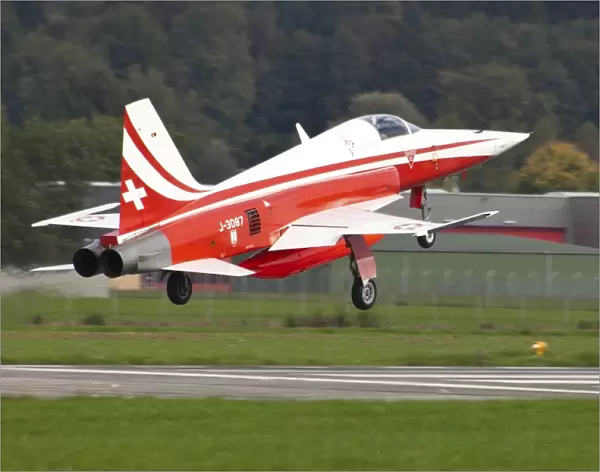 An F-5E Tiger of the Patrouille de Suisse demo team taking off