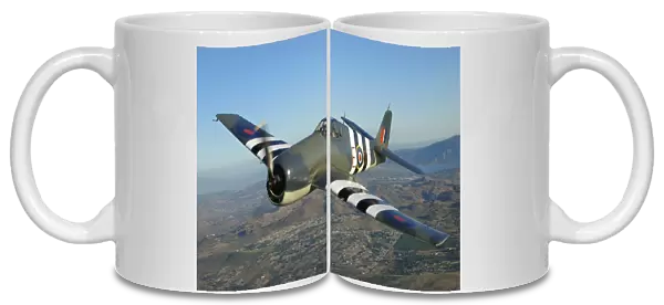 F6F Hellcat flying over Chino, California