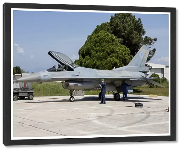 A Hellenic Air Force F-16C Block 52+ is readied for flight at Araxos Air Base, Greece