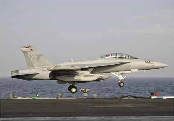An EA-18G taking off from the flight deck of USS George H. W. Bush