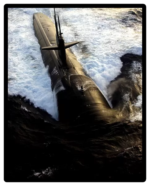 The Los Angeles-class submarine USS Albuquerque surfaces in the Atlantic Ocean