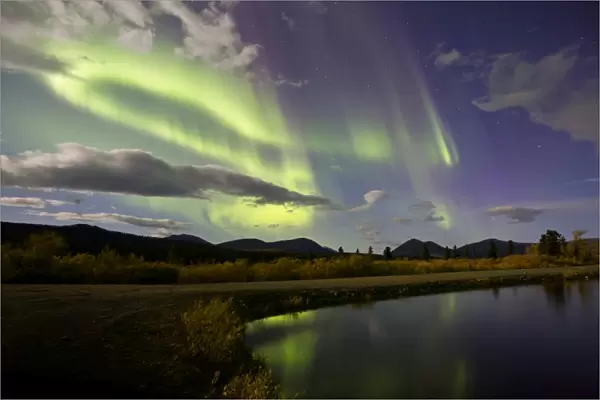 Aurora borealis with moonlight at Fish Lake, Yukon, Canada