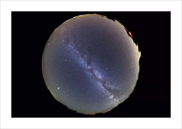 Fish-eye lens view of sky with Milky Way