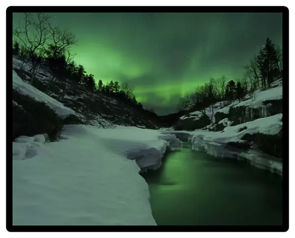 Aurora Borealis over Tennevik River, Troms, Norway