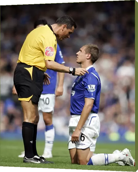 Referee Andre Marriner Confers with Everton's Phil Jagielka during Everton vs Blackburn Rovers, Barclays Premier League (2008)