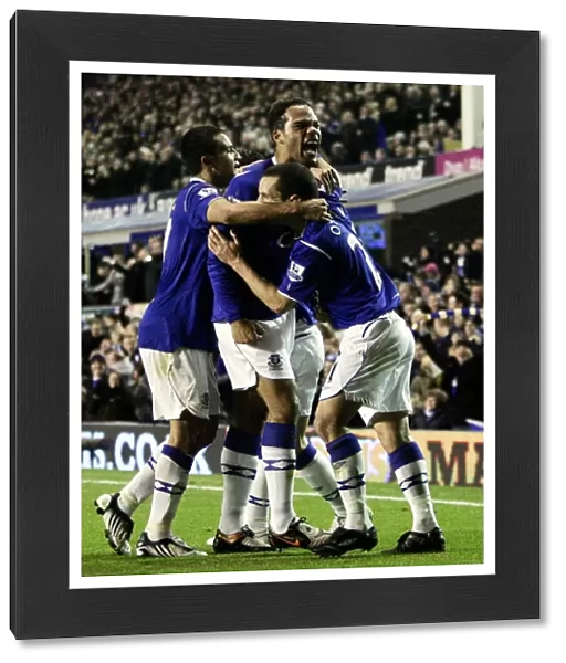 Everton's Joleon Lescott Scores First Goal, Celebrates with Tim Cahill and Leon Osman (08 / 09)