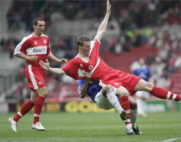 The Riverside Stadium -Middlesbroughs Robert Huth is pulled to ground by Simon Davies of Everton