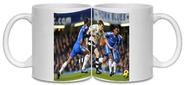 Clash at Stamford Bridge: Seamus Coleman Stands Firm Against Chelsea's Ashley Cole and Florent Malouda
